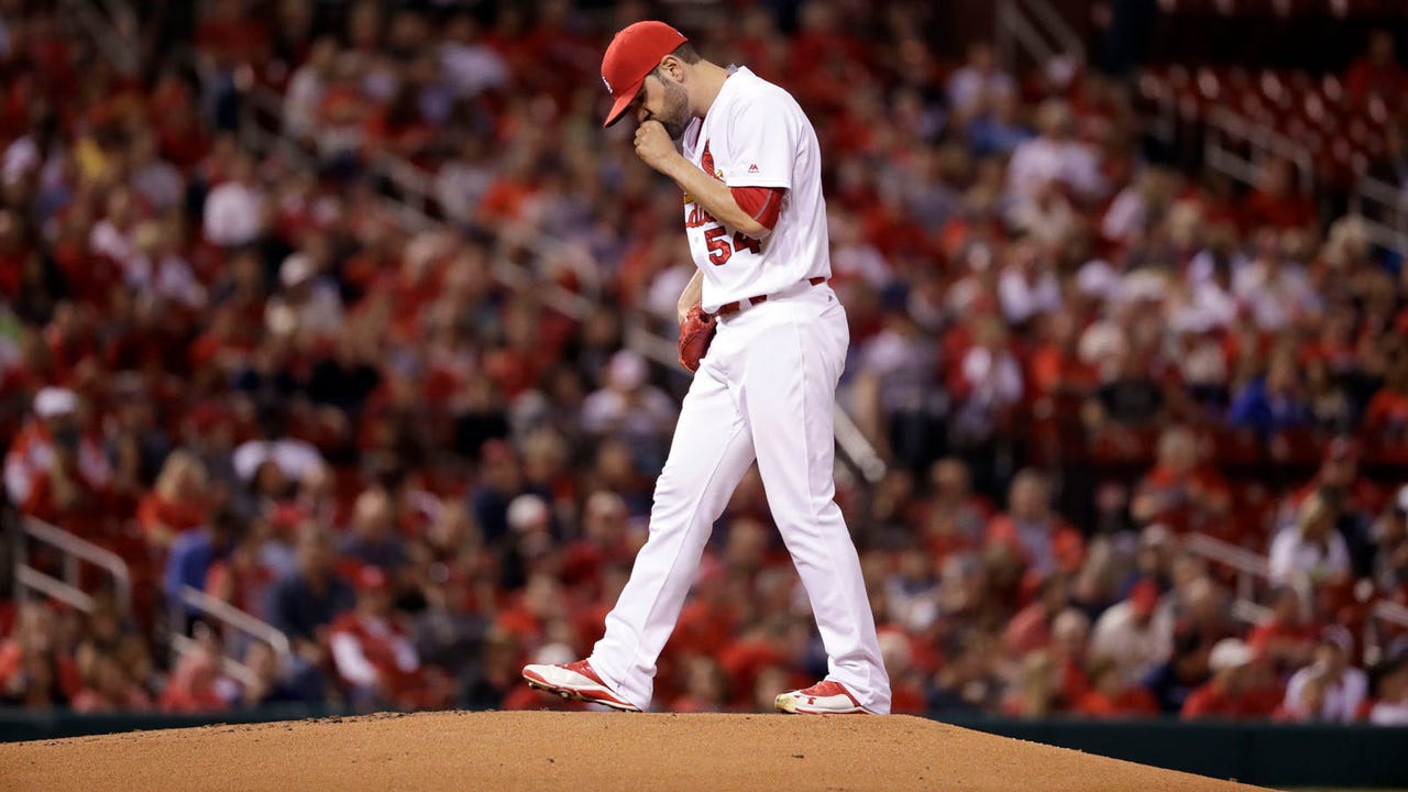 Reds' offense rakes as Cardinals fall 15-2